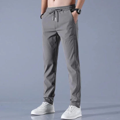 🔥 Buy 1 Get 1 Free • Premium Men’s High-Stretch Skinny Lycra Track Pants (Black & Grey)
